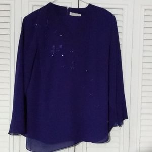 Purple pantsuit in sheer fabric. 16W